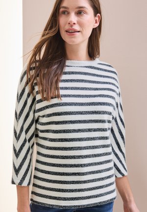 Pull rayé à manches trois-quarts. Fabriqué en tissu doux et texturé avec des rayures blanches et noires alternées. Encolure ronde.