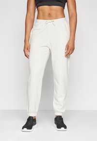 Reebok FRENCH TERRY - Tepláky - chamel