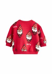 Červená mikina s opakujícími se motivy Santa Clause, s klobouky v kostkovaném vzoru, měkkou texturou a žebrovanými manžetami a výstřihem.