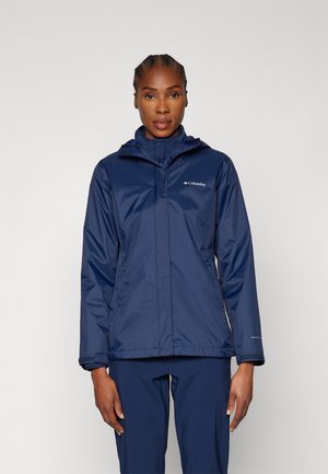 Navy blue waterproof jacket with a hood, zippered front, and elastic cuffs, featuring a logo on the chest and a smooth, shiny texture.
