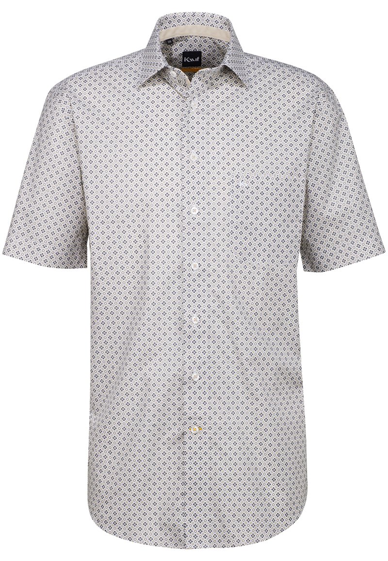 Camicetta a maniche corte con tessuto leggero. Presenta un motivo geometrico blu e bianco, colletto a punta e una tasca sul petto.