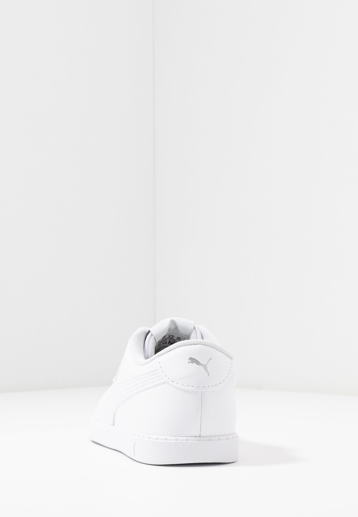 slim white trainers