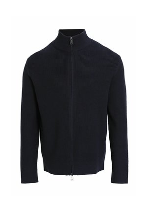 Marineblauer, gerippter Strick-Zip-Hoodie mit hohem Kragen und langen Ärmeln. Besitzt einen silbernen Reißverschluss und ein figurnahes Design mit einer strukturierten Oberfläche.