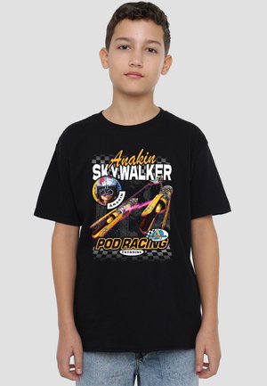 Black cotton t-shirt featuring Anakin Skywalker graphic, colorful pod racers, and text in orange and white against a checkered background.