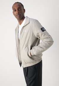 Calvin Klein Jeans PADDED HARRINGTON - Giacca da mezza stagione - flint gray