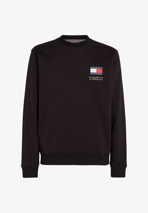 Schwarzer Langarm-Sweatshirt mit gerippten Bündchen und Saum, mit kleinem Tommy Jeans-Logo und Schriftzug auf der linken Brust.