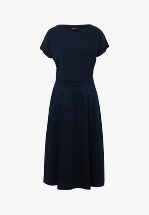 Temno modra obleka s kratkimi, kapicami, oprijetim korpusom in gubanim krilom. Ima okrasni gumb na strani. Material je mešanica bombaža.