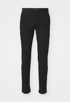 Schwarze Chinos aus einer Baumwollmischung, Slim-Fit-Design, mit braunem Knopfverschluss, zwei seitlichen Taschen und umgeschlagenen Säumen.