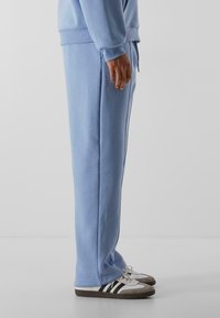 9N1M SENSE SENSE ESSENTIAL FLUFFY - Treniņtērpa apakšdaļas - powderblue