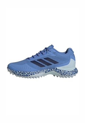 Light blue running shoe with a textured upper, navy accents, and a leopard print midsole. Features a cushioned sole and perforated ventilation.