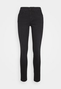 Jeans skinny en denim noir avec taille haute. Ils disposent de cinq poches et d'une texture lisse. Le tissu est extensible pour plus de confort.