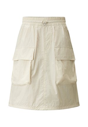Light beige skirt with an elastic waistband, featuring two large side pockets and a slightly flared A-line shape, made of a textured fabric.