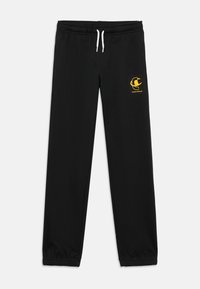 Μαύρο παντελόνι φόρμας με ελαστική μέση, λευκά κορδόνια και κίτρινο λογότυπο στο πάνω μέρος του μηρού. Μαλακό, απαλό ύφασμα με ελαστικά τελειώματα.