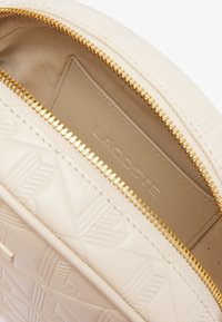 Lacoste SHOULDER - Sac à main - bone white