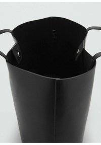 Black leather tote bag with a smooth texture and open top. Features two short handles and interior with no additional compartments.