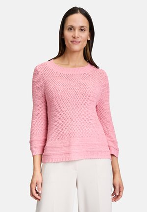 Maglione rosa lavorato a maglia con scollatura rotonda, maniche a tre quarti, motivo testurizzato e orlo dritto.