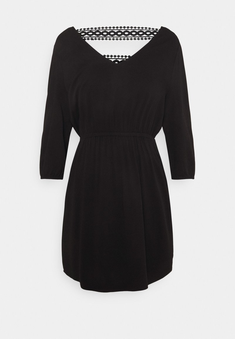 Robe noire mi-longue avec des manches trois-quarts, décolleté en V, taille élastique et dentelle décorative au niveau de la poitrine et du dos.