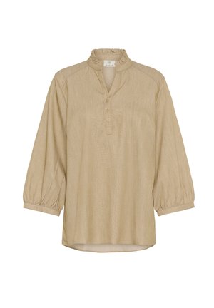 Svetlo bež tunika z nabranim ovratnikom, tremi gumbi in 3/4 puff rokavi. Narejena je iz teksturirane tkanine z rahlim sijajem.