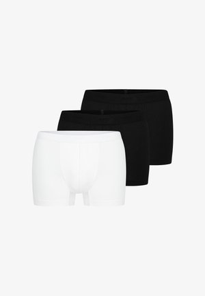 Drei Herren-Boxershorts, zwei schwarze und eine weiße, nebeneinander mit minimaler Schattierung auf weißem Hintergrund angeordnet.