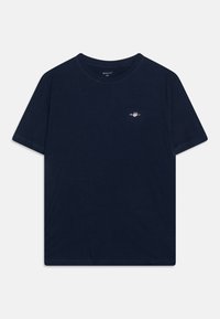 T-shirt in cotone navy a maniche corte, collo rotondo e un piccolo logo sul lato sinistro del petto. Texture liscia e vestibilità classica.