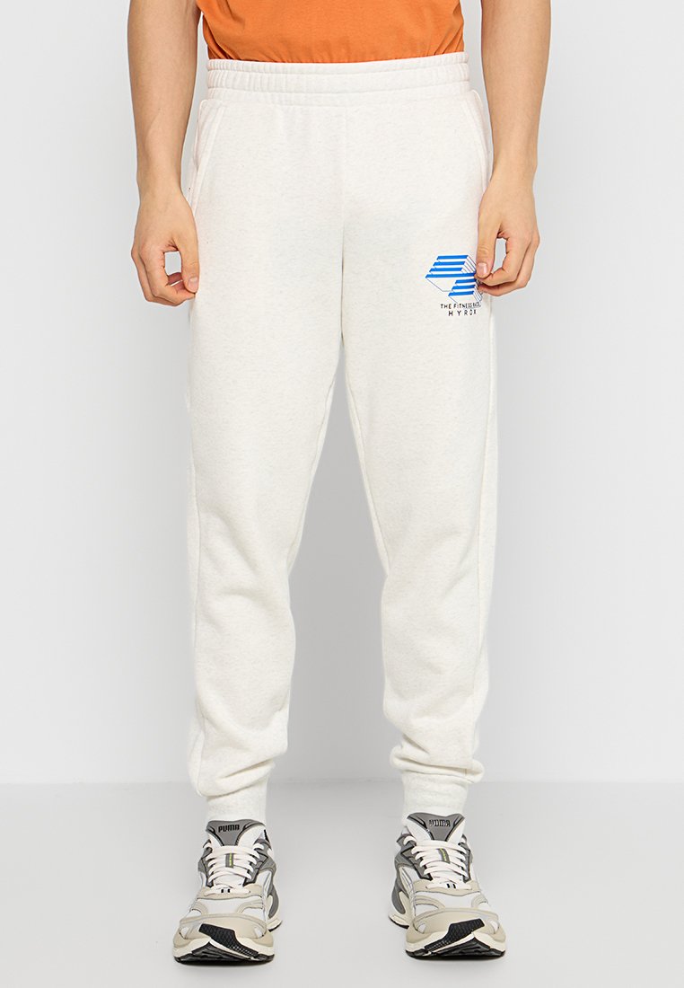 Puma Trainingsbroek crème Puma Trainingsbroek crème