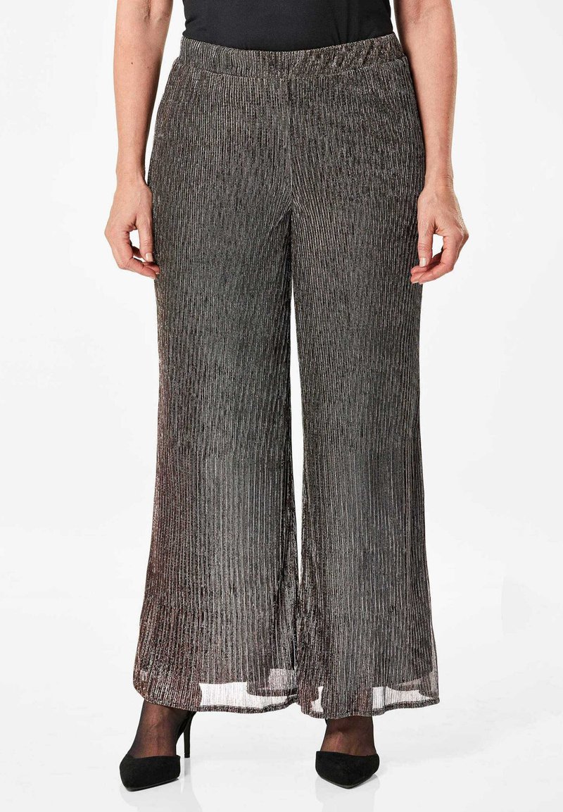 Weite Hosen im plissierten Design, hergestellt aus schwarzem und silbernem Stoff mit metallischem Glanz. Mit elastischem Bund und fließender Silhouette.
