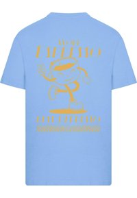 Light blue cotton t-shirt featuring a large yellow graphic of a smiling cartoon coffee cup with text saying "More Espresso" and "Less Depresso."