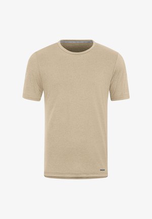 Helle, sandfarbene Kurzarm-T-Shirt aus weichem Stoff. Verfügt über einen Rundhalsausschnitt und ein kleines Logo-Detail nahe dem Saum. Glatte Textur.