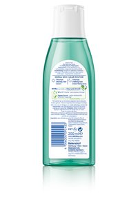 NIVEA Refining Toner bottle back label with usage instructions, ingredients, recycling info, and company details in multiple languages.