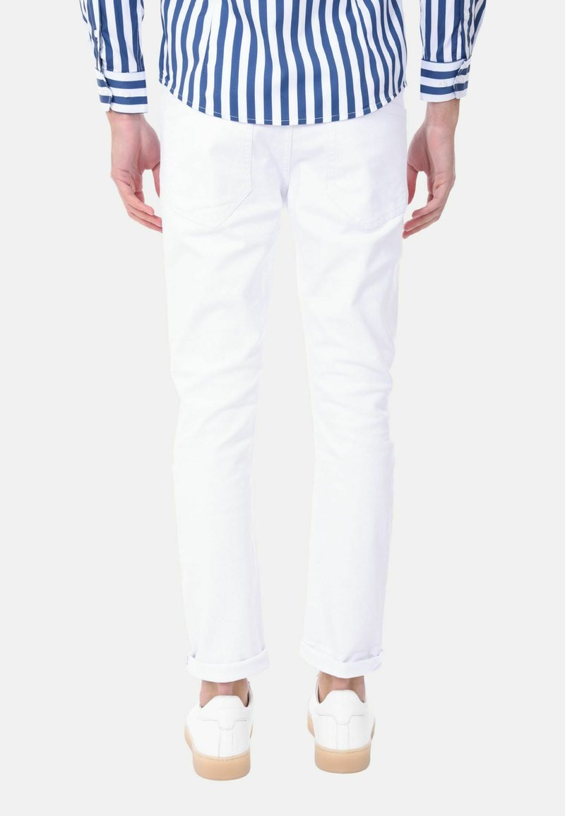 Bianchi Strappati Jeans Bianchi Sfrangiati Ciabalù STRAPPATI Jeans