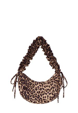 Leopard print handbag with a crescent shape, made of soft fabric. Features a gathered strap and ties on each side for adjustable length.
