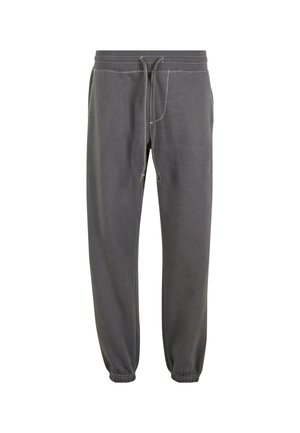 Pantalones de chándal grises de algodón con cintura ajustable mediante cordón, puños acanalados y costuras en contraste. Presentan un corte relajado y bolsillos laterales.