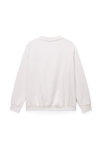 Ελαφρώς μπεζ φούτερ από μαλακό ύφασμα, με στρογγυλή λαιμόκοψη, μακριά μανίκια και ριμπ τελειώματα στα μανίκια, με άνετη εφαρμογή στη μέση.