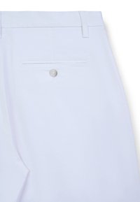 White trousers featuring a flat front design, side and back pockets, and a button closure on the back pocket, made from smooth fabric.