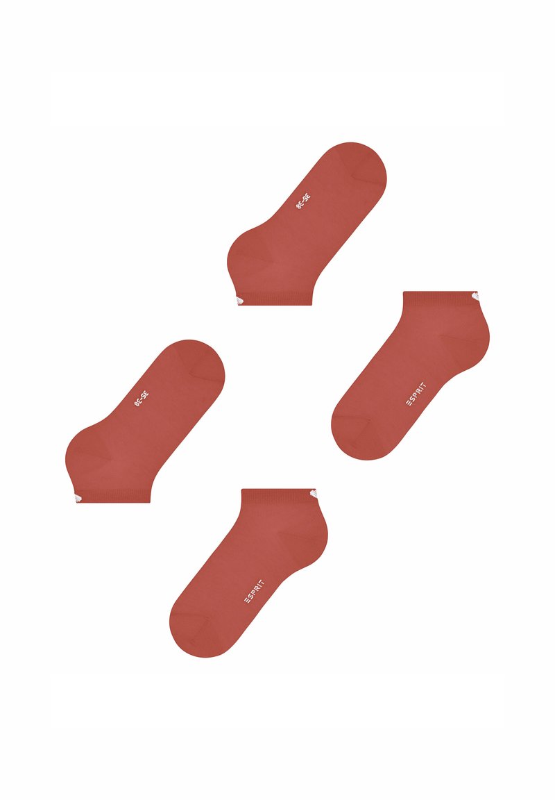 Chaussettes de cheville rouges en tissu lisse, avec un coffre côtelé et un logo blanc. Quatre paires disposées dans différentes orientations.