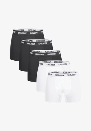 Conjunto de pantalones cortos tipo boxers en blanco y negro, con una banda elástica suave en la cintura que lleva el logo "SMILODOX". Fabricados con un tejido elástico y transpirable.