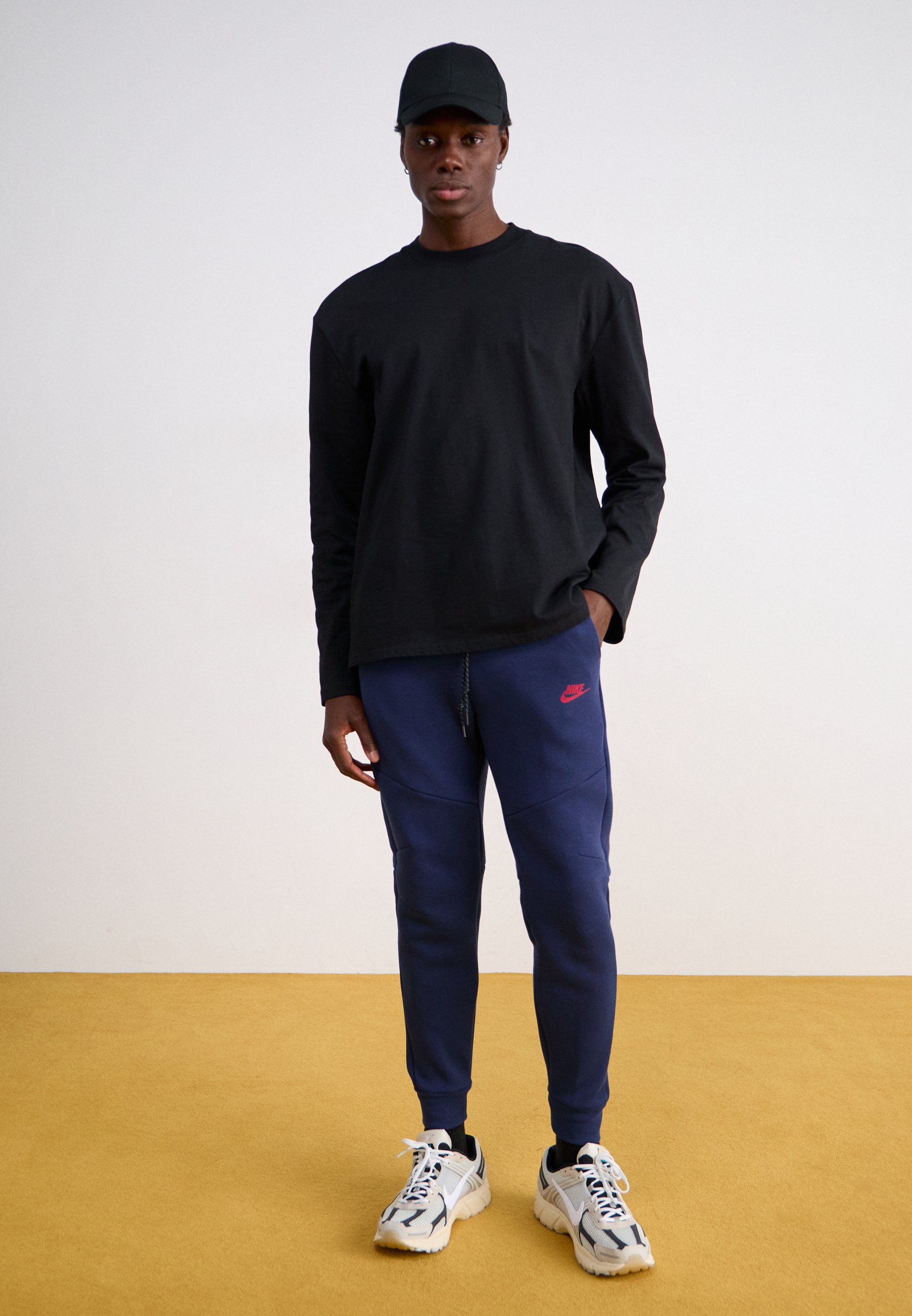 nike tech navy joggers