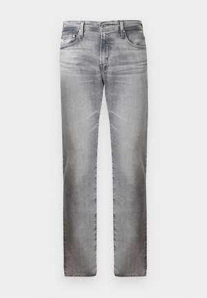Hallid denim teksad heledate mustriga, sirge jalaga lõikega, viie taskuga ja metallnööp sulgemisega vööl. Pehme tekstuur, ilma eristatavate mustriteta.