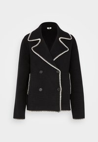 Zwarte dubbelgebreide blazer met contrasterende witte stiksels, voorzien van een gelopte kraag, twee zijzakken en zwarte knopen.