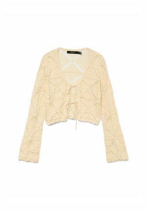 Pull en crochet crème à manches longues, avec un décolleté en V et un front à nouer. Présente des motifs en losange texturés et un ourlet festonné. Matière en maille légère.