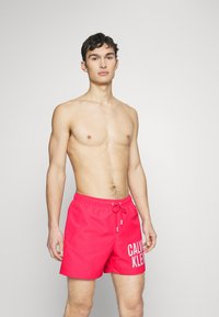 Calvin Klein Swimwear MEDIUM DRAWSTRING - Badeshorts - pink flash