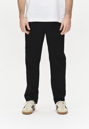JOE UNITE - Trousers - black