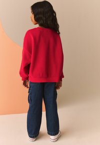 Next Svetr - red