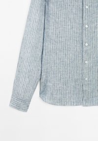 Long-sleeve blue and white vertical striped button-up shirt with cuffed sleeves, displayed against a plain white background.