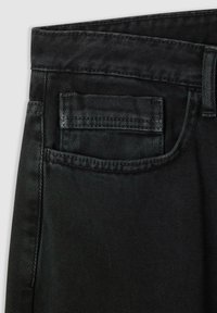 Jeans in denim nero con vita media, tessuto leggermente testurizzato e una tasca posteriore con contorno cucito.
