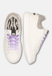 White sneakers with a smooth leather exterior, lavender laces, and textured accents featuring a black and white pattern inside the collar.