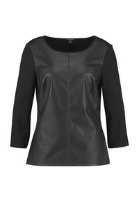 Schwarzes Oberteil mit einer Lederfront und dehnbarem Stoff an den Ärmeln. Verfügt über einen runden Halsausschnitt, Drei-Viertel-Ärmel und Nahtdetails am Oberteil.