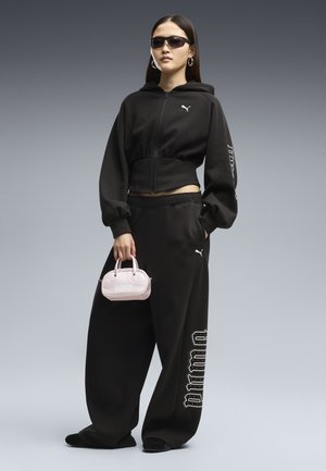 Puma, STREET GLAM SLOUCHY BEDAZZLED PANTS FL - Pantalon de survêtement - puma black