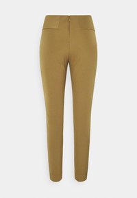 Zúžené béžové kalhoty vyrobené z elastického materiálu, s vysokým pasem, minimalistickým designem a dvěma zadními kapsami se skrytým zipem.