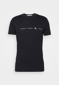 REPEAT LOGO TEE UNISEX - T-shirt estampada - black